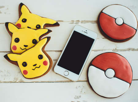 St. Petersburg, Russia - August 4, 2016 Editorial image: Fan Art Pikachu and Pokebol gingerbread and...