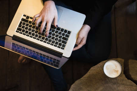 Woman using tablet computer in cafe on coffee breakの写真素材