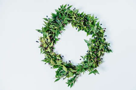 Christmas wreath with berries on white background. Top viewの写真素材