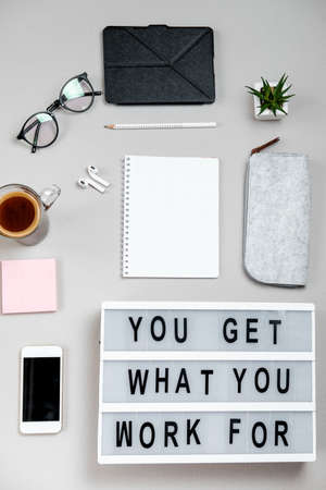 Motivational board, coffee and stationery. Business concept. Top view, flat lay. Vertikalの写真素材