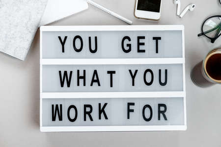 Motivational board and stationery. Business concept. Top view, flat layの写真素材