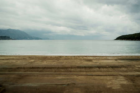 Wooden pier on blue sea background. の写真素材