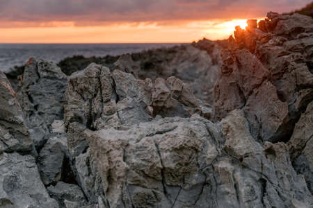 Color on the rock in sunset present line and colourful.の写真素材