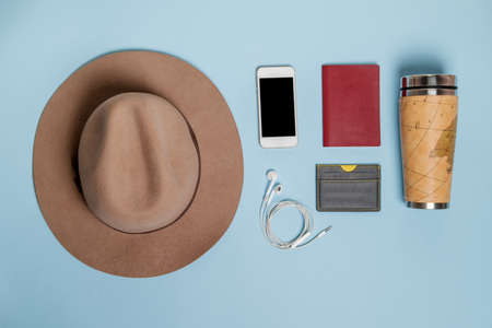 Traveling things with hat, bank card, thermos. Top viewの写真素材