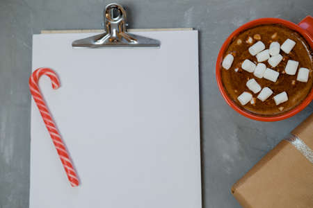 Letter for Santa, gifts and marshmallows. Top view, flat layの写真素材