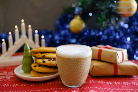 Christmas cookies with chocolate and cocoa on a red napkinの写真素材