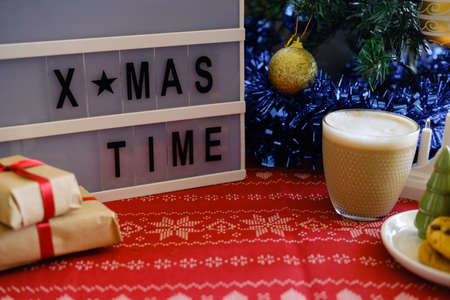 Christmas cookies with chocolate and cocoa on a red napkinの写真素材