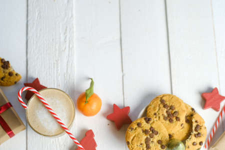 Flat lay composition with Christmas cookies, decor  and cocoa on the white tableの写真素材