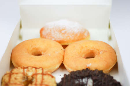 Assorted donut in paper container