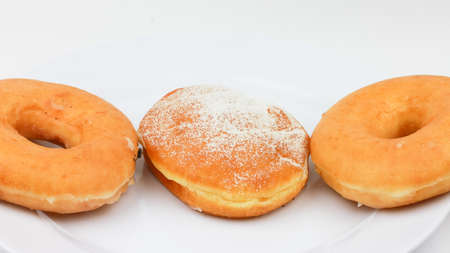 Assorted donut on white plate