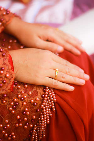 Engagement ring on bride fingerの写真素材