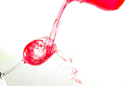 Fill glass with colorfull liquid.の写真素材