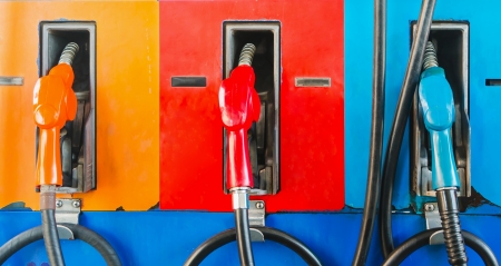 colorful fuel oil gasoline dispenser at petrol filling stationの写真素材