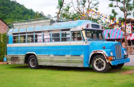 blue farm bus in countrysideの写真素材