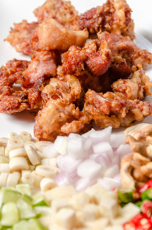 Fried pork with garlic and pepperの写真素材