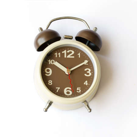 Clock Blond put on a white background.の写真素材