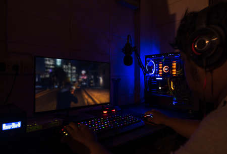 Gamer playing a game in a computer gameの写真素材