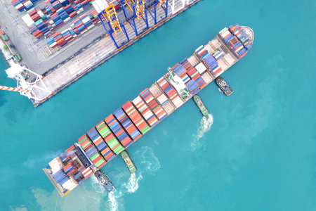 Aerial top view containers ship cargo business commercial trade logistic and transportation of...