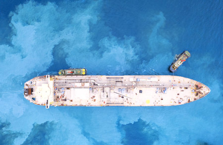 Top view Ship tanker gas LPG, Aerial view Liquefied Petroleum Gas LPG tanker, Tanker ship logistic and transportation business oil and gas industry, Loading  oil and gas offshore platforms.の写真素材