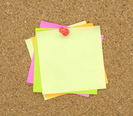 paper note pad pin on cork board