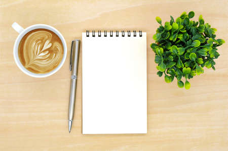 notebook on brown background top view copy spaceの写真素材