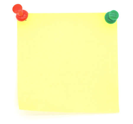 yellow note pad isolated on white background.の写真素材