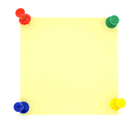 yellow note pad isolated on white background.の写真素材