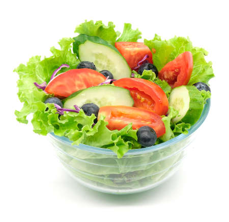 Salad fresh vegetables isolated on white backgroundの写真素材