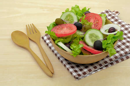 Salad fresh vegetables isolated on white backgroundの写真素材