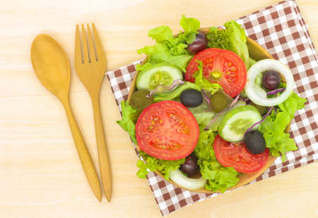 Salad fresh vegetables isolated on white backgroundの写真素材
