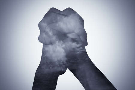 hand double exposure sky backgroundの写真素材