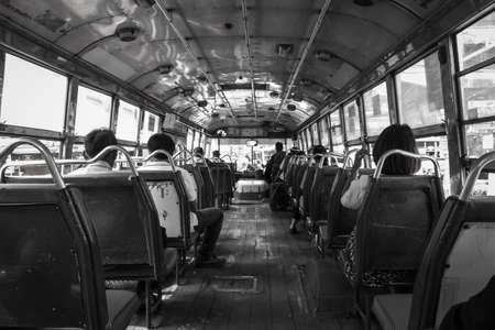 Inside the public bus with passengers.のeditorial素材