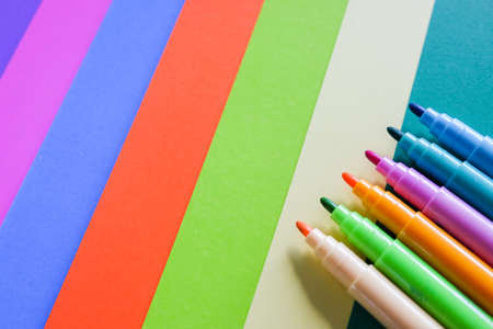 Colorful magic pens on papers background.の写真素材