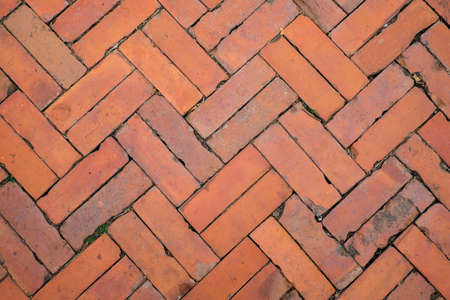 The old vintage brick walkway for texture or background.