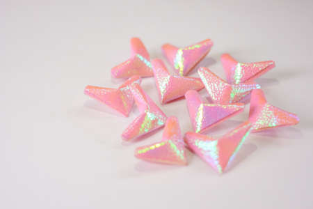 Pink paper hearts for Valentine's Day at white table for background or texture.の写真素材