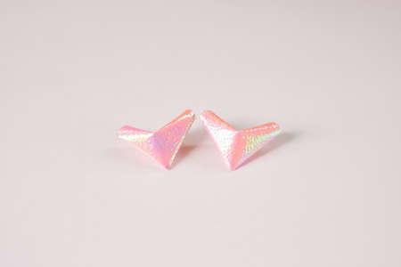 Pink paper hearts for Valentine's Day at white table for background or texture.の写真素材