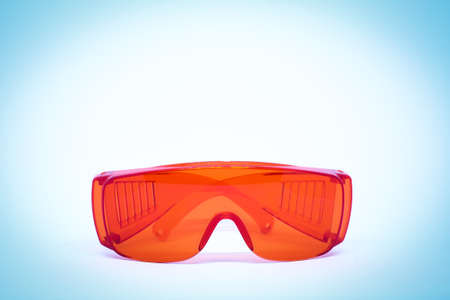 Plastic red waterproof glasses for background or texture.の写真素材