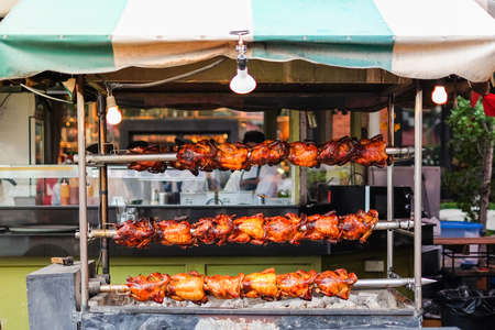 The homemade roasted chicken on skewers for street food background or texture.のeditorial素材