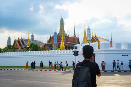 Bangkok, Thailand - November 10, 2017 : Beautiful Grand palace & Wat phra keaw (Wat Phra Sri Rattana Satsadaram) with the man taking pictures or photo and people (Famous buddhist temple for tourist).のeditorial素材