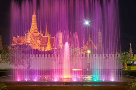 The emerald temple of Bangkok the capital cities of Thailand in twilight time with the colourful fountains show.の写真素材