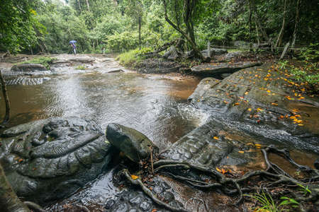 Kbal Spean waterfall the mystery place of ancient Khmer empire in Siem Reap, Cambodia.の写真素材