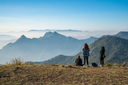 Group of women traveller standing to see the highland mountains in northern region of Thailand.の写真素材