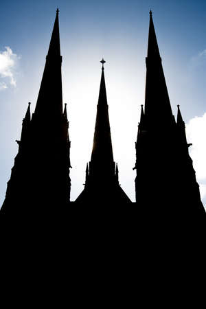 The silhouette of Saint Patrick cathedral in Melbourne, Australia.の写真素材