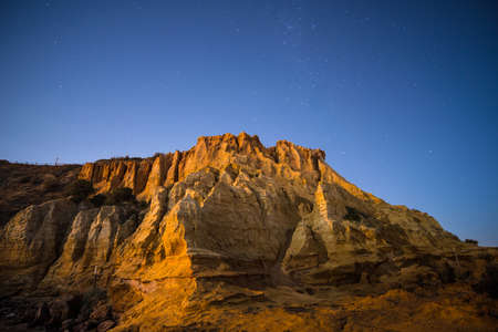 The sandstone cliff of the Black rock beach at half moon bay in the night time, Melbourne, Australia.の写真素材