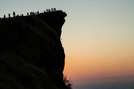 The silhouette of Phu Chi Fah the spectacular mountain landmark in Chiang Rai province of Thailand.の写真素材