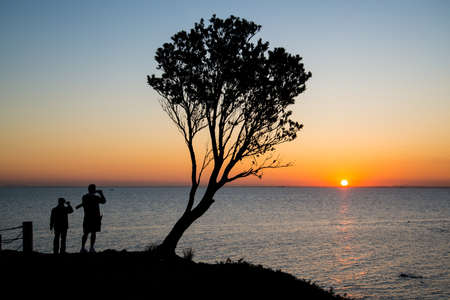 The beautiful sunset on the horizon sky of Brighton beach, Melbourne.