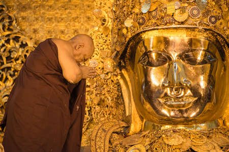 Mahamuni face washing ceremony in Mahamuni pagoda, Mandalay town of Myanmar.