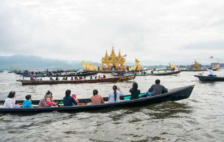 INLE-LAKE, MYANMAR - OCT 06 2014: The festival of Phaung Daw Oo Pagoda at Inle Lake is once a year are ceremonially rowed around the Lake.のeditorial素材