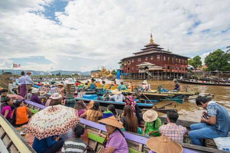 INLE-LAKE, MYANMAR - OCT 06 2014: The festival of Phaung Daw Oo Pagoda at Inle Lake is once a year are ceremonially rowed around the Lake.のeditorial素材