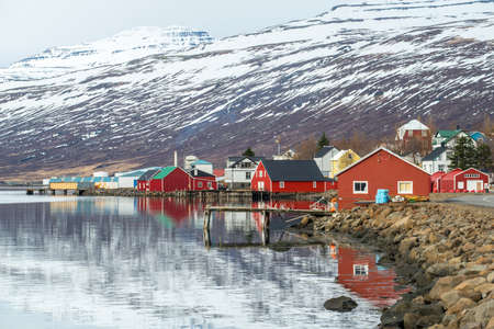 Eskifjordur the lovely fisherman village of east Iceland in winter season.の写真素材